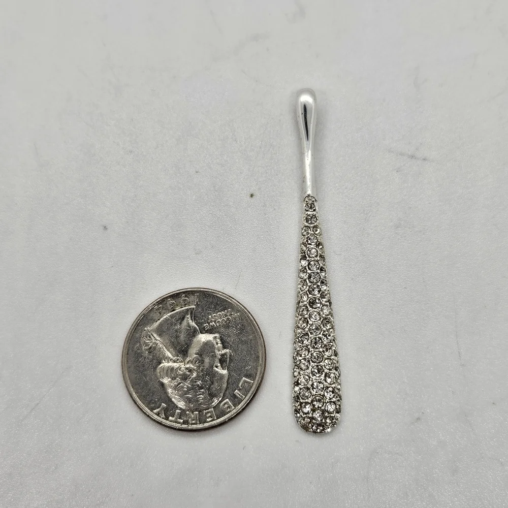 silver tone long skinny teardrop pendant with rhinestones